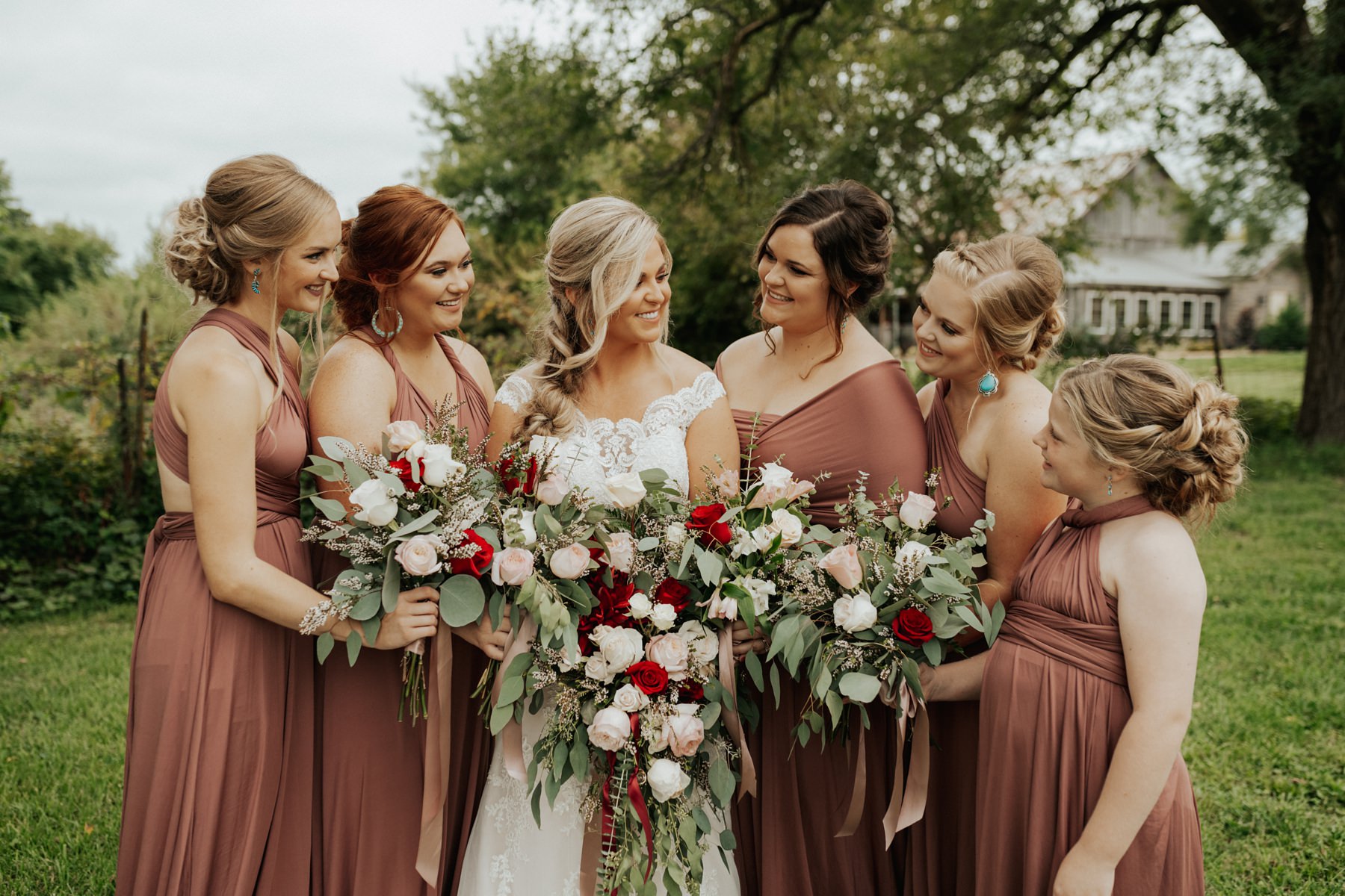 A bride and bridesmaids at The Barn at Belamour in Springfield, MO.
